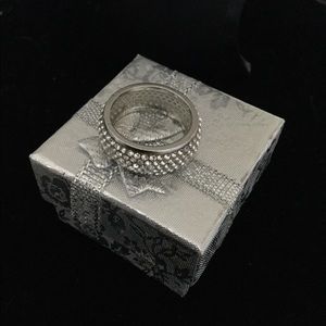 Sterling silver ring with white sapphires Around